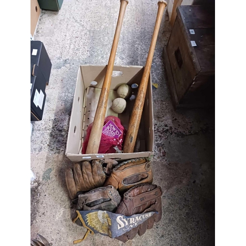 142 - CARTON WITH 2 LOUIS VILLE SLUGGER BATS & 3 BASEBALL GLOVES, 2 BALLS & BAG OF BOULES