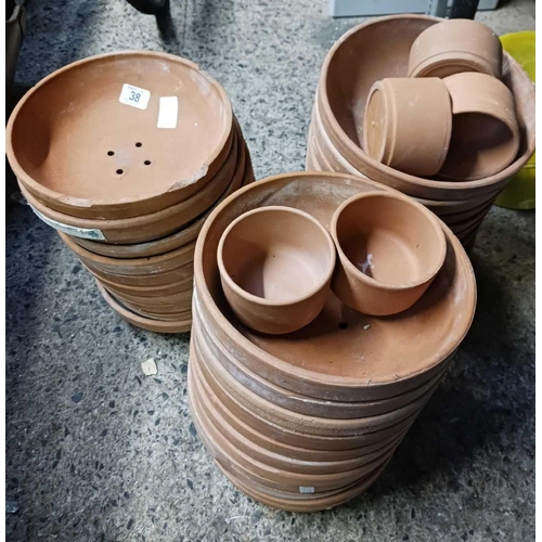 38 - QTY OF EARTHENWARE ROUND PIGEON FEEDER TROUGHS, SOME WITH PERFORATIONS