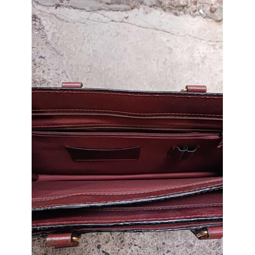 48 - LEATHER BRIEFCASE