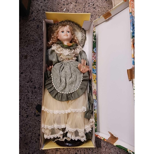 78 - 8 BOXED PORCELAIN DOLLS