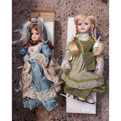 78 - 8 BOXED PORCELAIN DOLLS