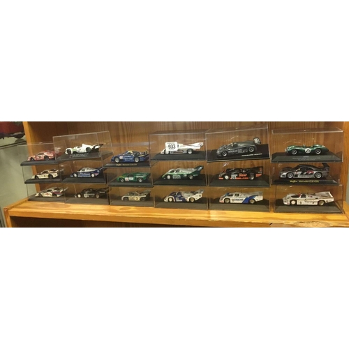 933 - 18 BOXED MODEL RACE CARS