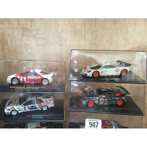 947 - 8 IXO BOXED MODEL RACING CARS