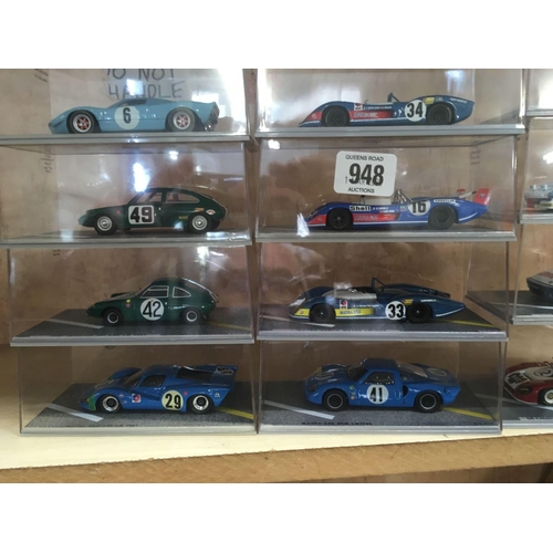 948 - 18 BIZARRE BOXED MODEL RACE CARS