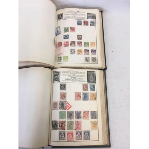 961 - 2 OLD ALBUMS OF WORLD STAMPS