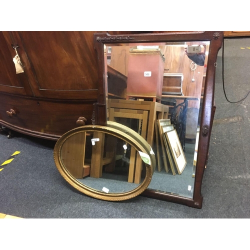 500 - GILT FRAMED OVAL MIRROR & A BEVELLED EDGE OVER MANTLE MIRROR