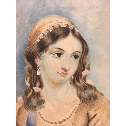 528 - A GOOD 19THC WATERCOLOUR PORTRAIT OF A YOUNG WOMAN WEARING A RUBY & EMERALD NECKLACE, UNFRAMED, 9'' ... 