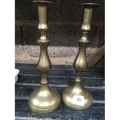 55 - PAIR OF BRASS CANDLESTICKS