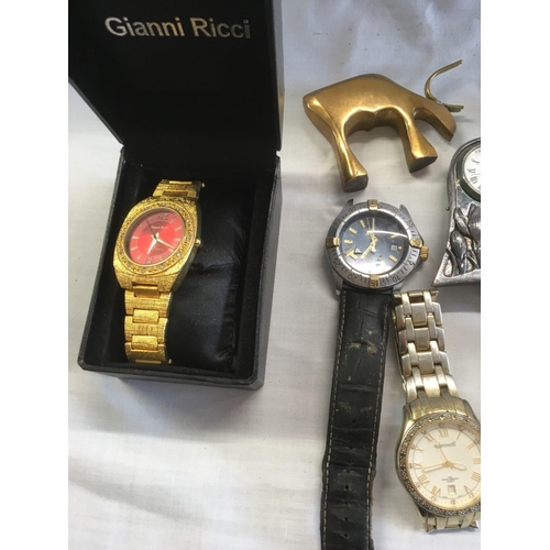 826 - TUB OF MISC LADIES & GENTS WATCHES INCL; GIANNI RICCI, BRASS PAPERWEIGHT & A SMALL METAL DESK CLOCK