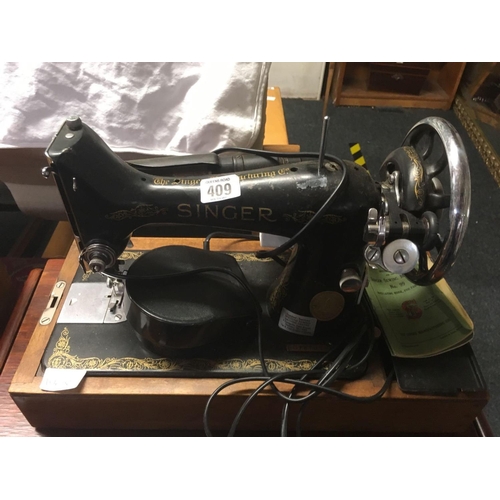 409 - SINGER SEWING MACHINE & SEWING TABLE