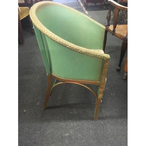 581 - GREEN TUB LOOM CHAIR