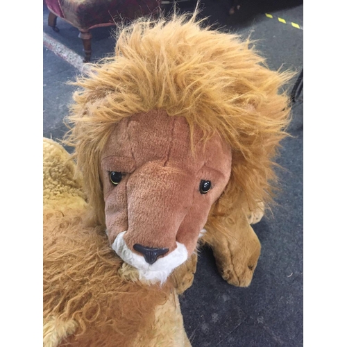 585 - 2 TOY LION FIGURES