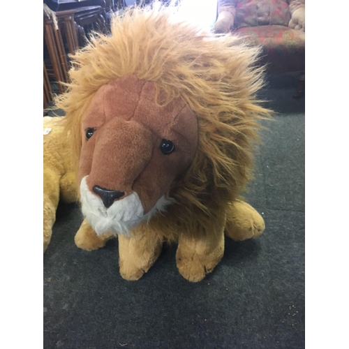 585 - 2 TOY LION FIGURES