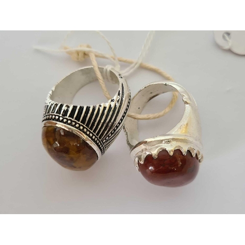 701 - 2 LARGE WHITE METAL RINGS WITH STONES