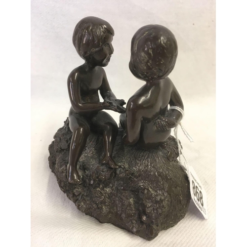 868 - 2 BRONZED FIGURES OF CHILDREN ON A ROCK BY KEREK