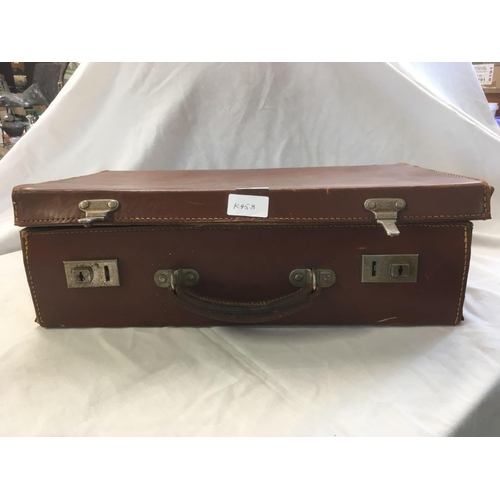 944 - SMALL LEATHER SUITCASE WITH MISC MILITARY EPHEMERA INCL; A COLMAN'S MUSTARD TIN, MILITARY MARKED SUG... 