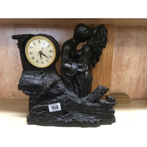 958 - BLACK RESIN CLOCK WITH FIGURES