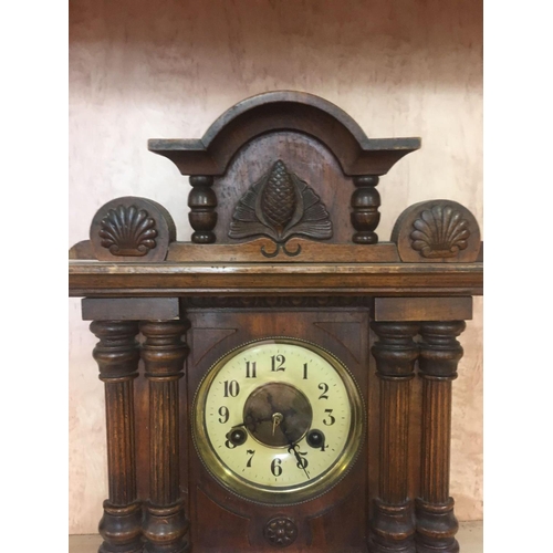 963 - ORNATE WOOD CASED MANTEL CLOCK