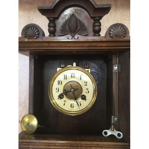 963 - ORNATE WOOD CASED MANTEL CLOCK