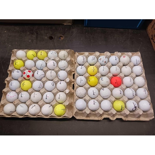 166 - 2 EGG TRAYS OF GOLF BALLS