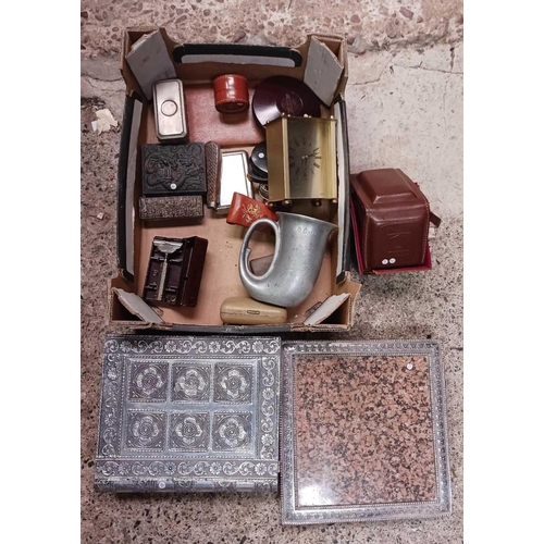 20 - CARTON WITH MISC METALWARE, CARRIAGE CLOCK,BROWN CAMERA CASE, TRIVET & A MIDDLE EASTERN WHITE METAL ... 