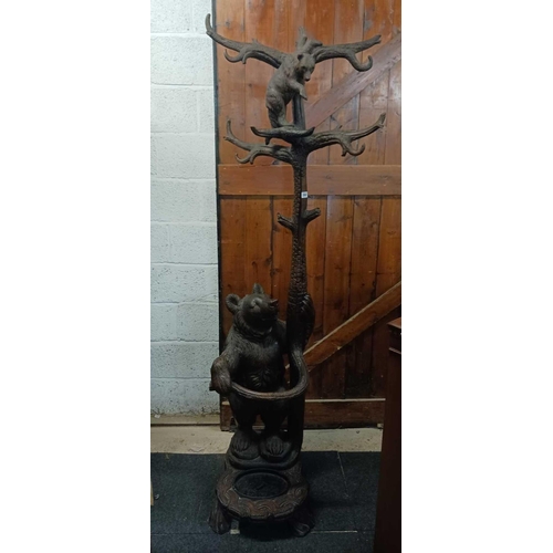 260 - WOODEN SOUTH GERMAN CARVED HALL STAND IN FORM OF A BEAR STANDING ON HIND LEGS WITH AN OVAL METAL DRI... 