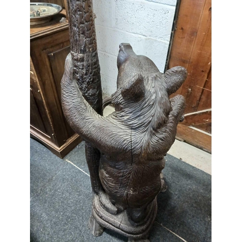 260 - WOODEN SOUTH GERMAN CARVED HALL STAND IN FORM OF A BEAR STANDING ON HIND LEGS WITH AN OVAL METAL DRI... 