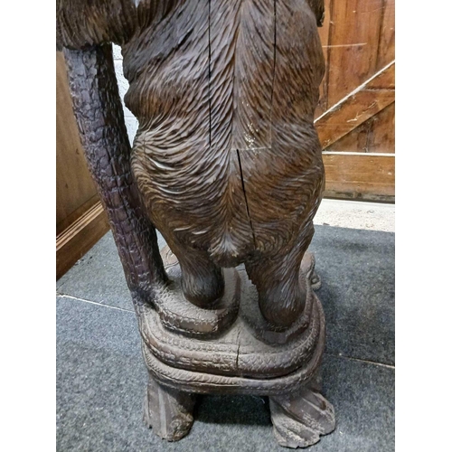 260 - WOODEN SOUTH GERMAN CARVED HALL STAND IN FORM OF A BEAR STANDING ON HIND LEGS WITH AN OVAL METAL DRI... 