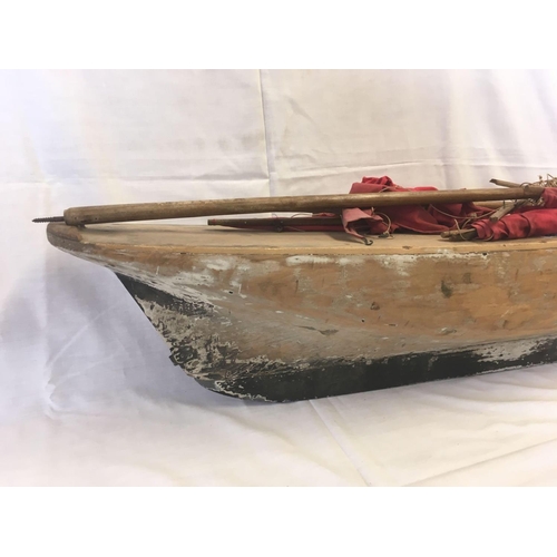 333 - MODEL BOAT WITH RED SAILS