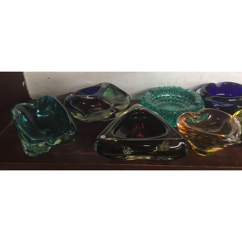 470 - SHELF OF GLASS ASHTRAYS