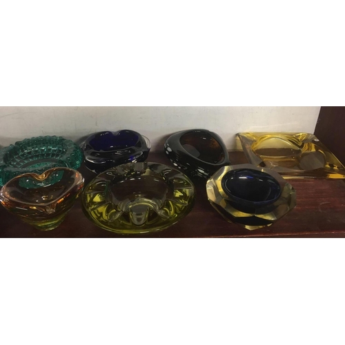 470 - SHELF OF GLASS ASHTRAYS