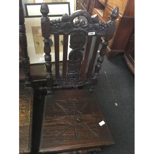 499 - 2 HEAVILY CARVED DINING CHAIRS