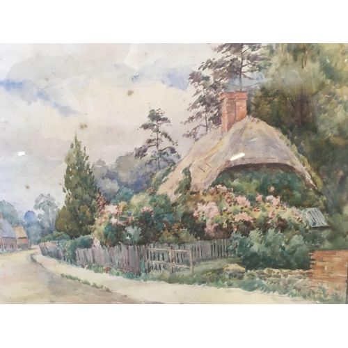 524 - AN EVEREST 1922, WATERCOLOUR OF A VILLAGE STREET SCENE WITH THATCHED COTTAGE & SUMMER GARDEN ETC, SI... 