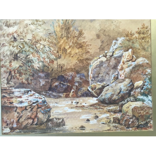 552 - 19THC UNFRAMED WATERCOLOUR IN GILT MOUNT OF A ROCKY RIVER SCENE IN WOODLAND. BEARS INSCRIPTION TO RE... 