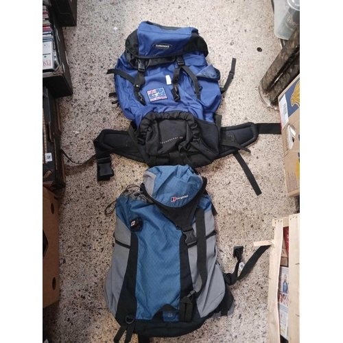 58 - HALFORDS WALL MOUNTING CYCLE RACK, A EURO HIKE & A BERGHAUS BACK PACK & 1 LARGE WHEELED TOTE BAG