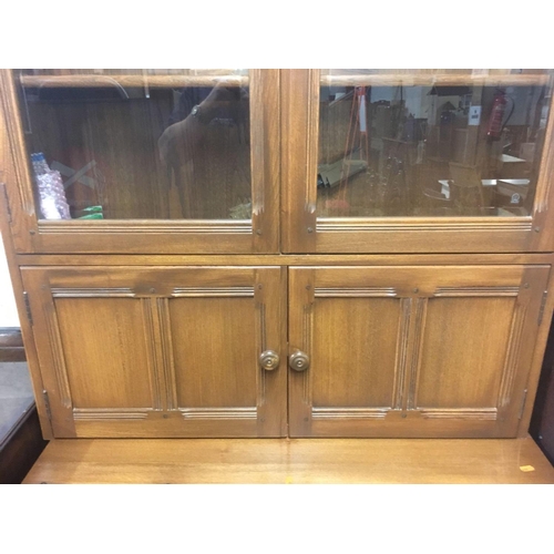 592 - ERCOL GLAZED DISPLAY CABINET, 77'' HIGH X 38'' ACROSS APPROX X 17'' DEPTH