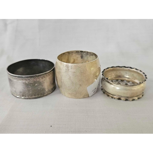 653 - 2 SILVER NAPKIN RINGS & 1 OTHER