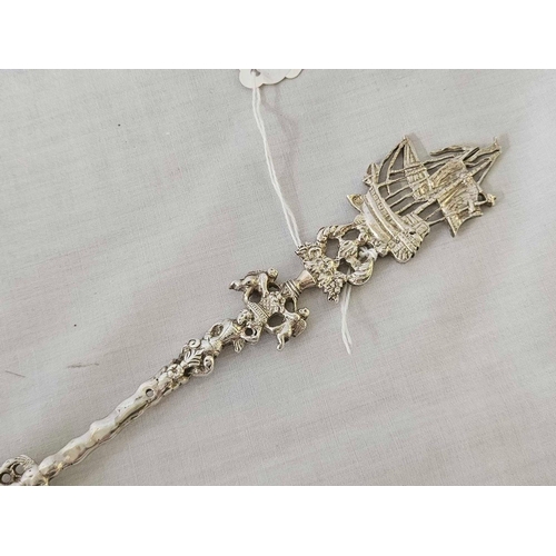 661 - IMPRESSIVE SILVER SERVING SPOON, LONDON BT A.L WITH FANCY & GALLEON STEM