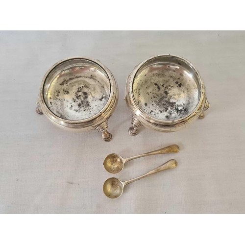 702 - A PAIR OF SILVER SALTS, PAD FEET, B.G.L, LONDON 1919 WITH SPOONS, 84g