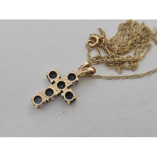 763 - A 6 STONE SAPPHIRE CROSS PENDANT SET IN 9ct WITH FINE 9ct CHAIN