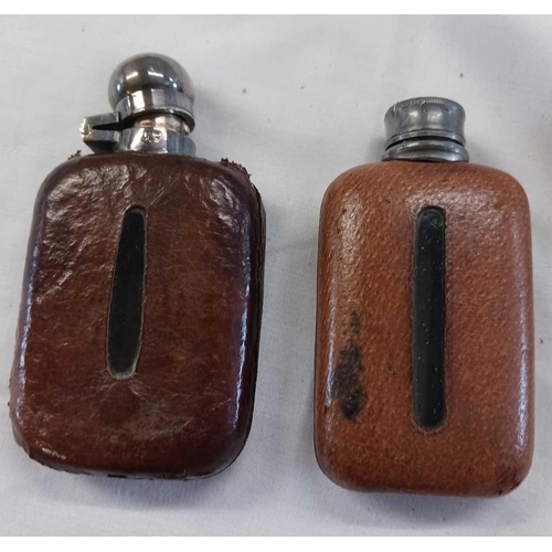 849 - 2 LEATHER SPIRIT FLASK OF SMALL SIZE, 1 WITH SILVER TOP A/F