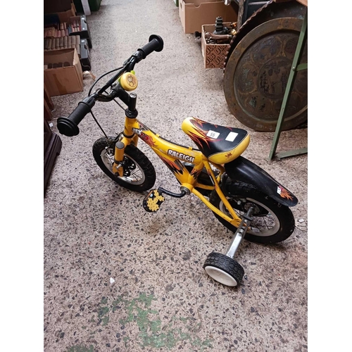 55 - YELLOW RALEIGH MX12 BIKE WITH OUT RIDERS & GREEN/BLACK CHILDS BIKE