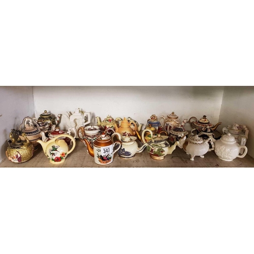 347 - SHELF OF NOVELTY TEA POTS