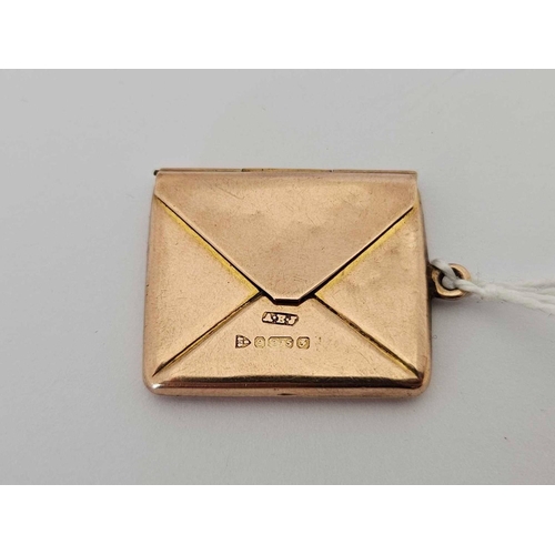 AN EDWARDIAN 9CT GOLD ENVELOPE STAMP HOLDER BY ALBERT ERNEST