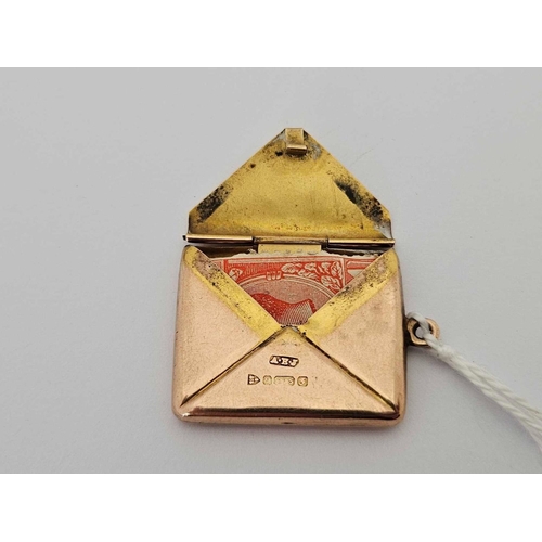 AN EDWARDIAN 9CT GOLD ENVELOPE STAMP HOLDER BY ALBERT ERNEST