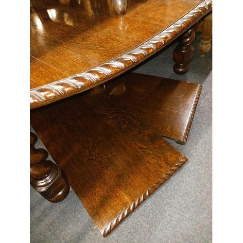 309 - OAK EXTENDING DINING TABLE IN BARLEY TWIST LEGS WITH 2 EXTRA LEAVES WITH MATCHING 6 CARVED BARLEY TW... 