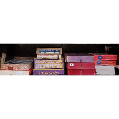 45 - SHELF OF VINTAGE JIGSAW PUZZLES NOT KNOWN IF COMPLETE