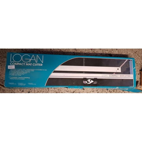 54 - LOGAN COMPACT MAT CUTTER IN BOX & A KAISER PRO MASKING FRAME IN BOX