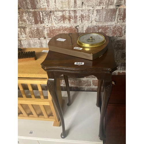 206 - PINE OR BEACH MAGAZINE RACK, SMALL WINE TABLE & A BRUSH SET & BAROMETER