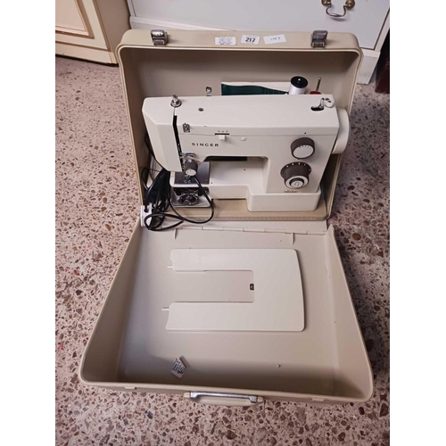 217 - VINTAGE ELECTRIC SINGER SEWING MACHINE IN CASE